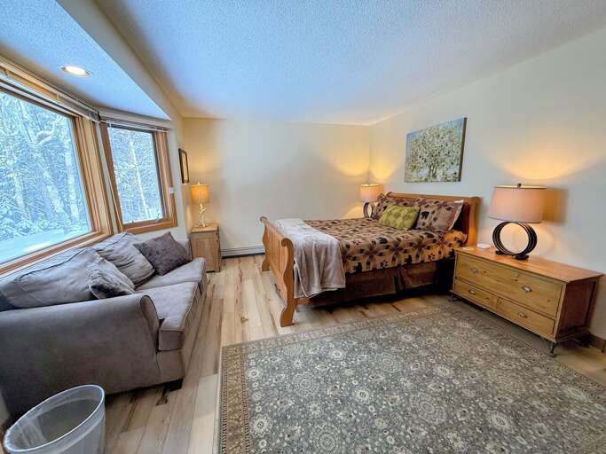 Guest Room #1: Located on the main level and features a queen bed and large closet. Shared bath across the hall. Sleeps 2.