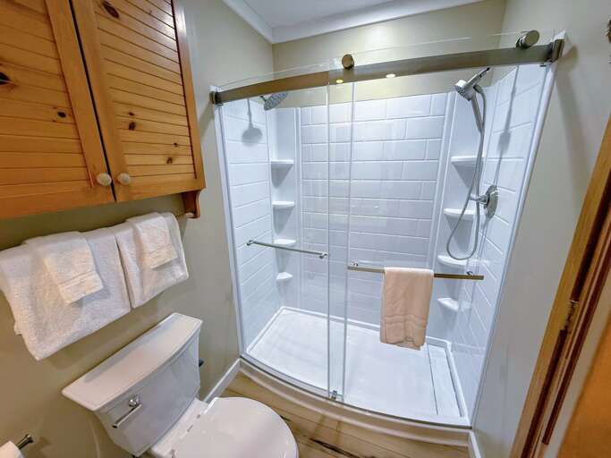 Newly updated winter 2024! Main Level Queen Bedroom Ensuite Bath with shower.