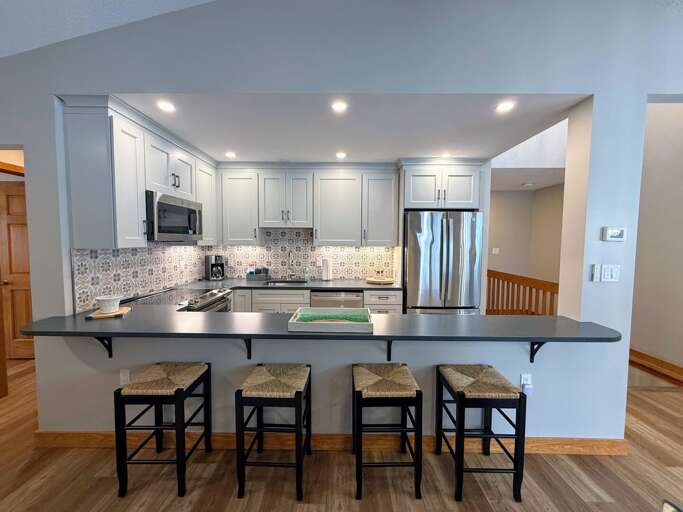 Kitchen: Full stocked for all your cooking needs and includes a drip coffee maker, microwave and dishwasher.