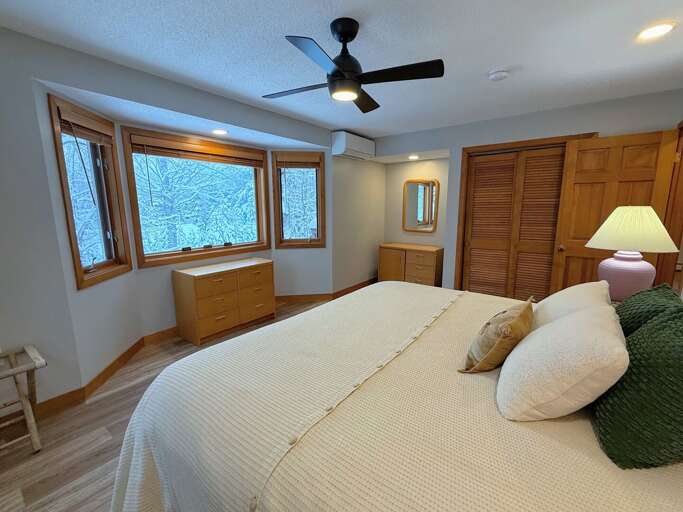 Primary Bedroom with King Bed - Across the hall from shared bath with shower.
