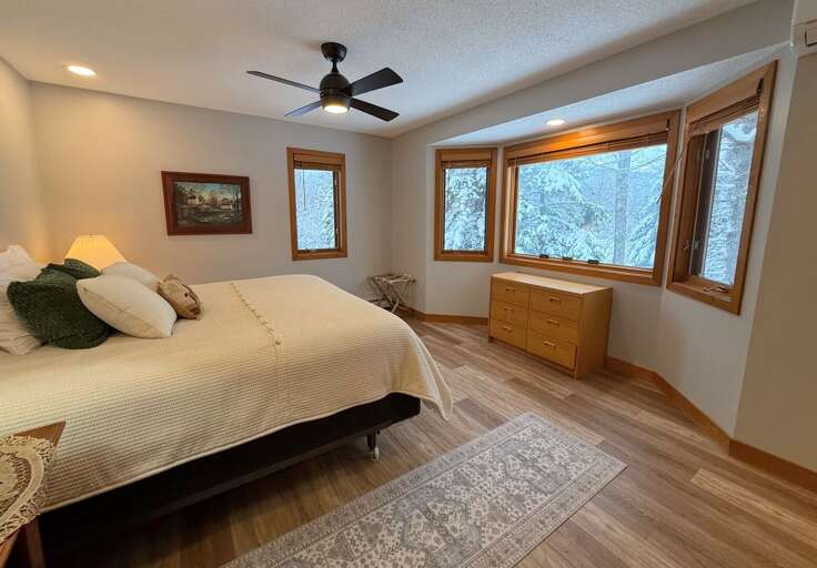 Primary Bedroom with King Bed - Across the hall from shared bath with shower.