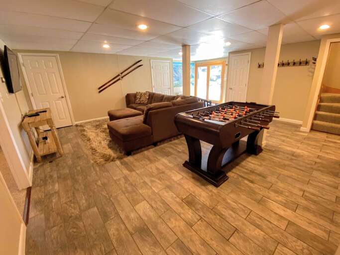 Lower Level: Extra living space and game room.