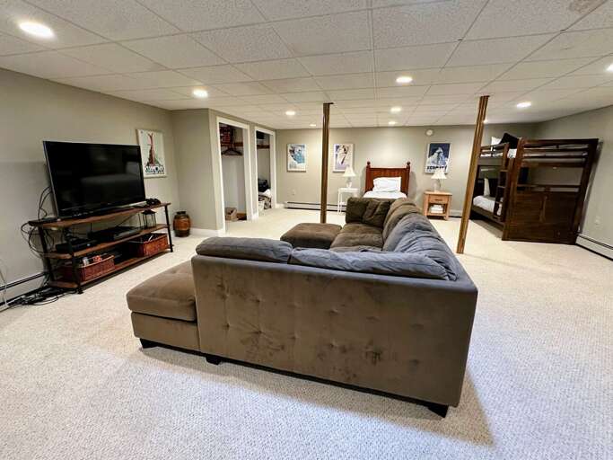 Lower level living area with twin bed and bunk bed Lower level living area with twin bed and bunk bed