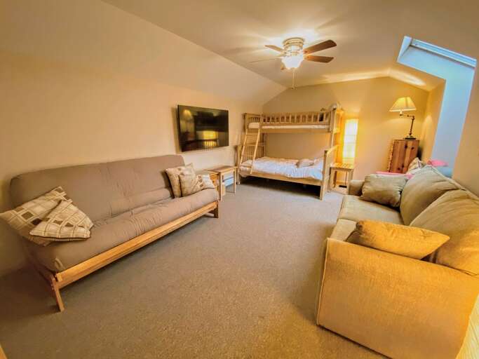 Guest Bedroom #1: Located in the loft and features a Twin/Full bunk bed, futon and TV. Sleeps 3 (futon not included in sleeping count)