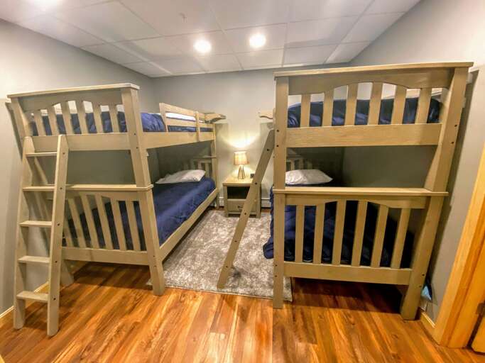 Guest Bedroom #5: Located on the lower level and features 2 Twin/Twin bunk beds. Sleeps 4.