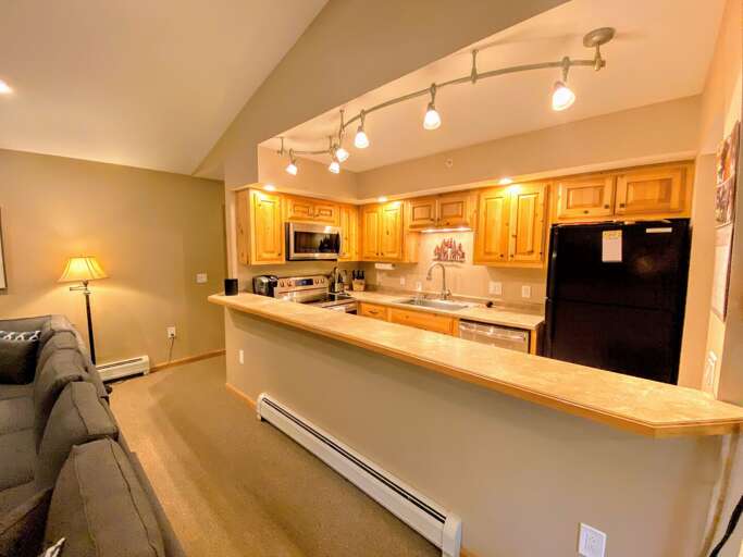 Kitchen: Newly updated and fully stocked for all your cooking needs! Includes both a drip coffee maker and keurig, stainless steel appliances.