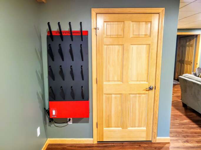 Lower level: Extra living/game room with beautiful comfortable furniture, TV and access to back yard.