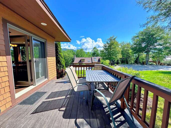 The deck is accessible from the yard and the living room slider