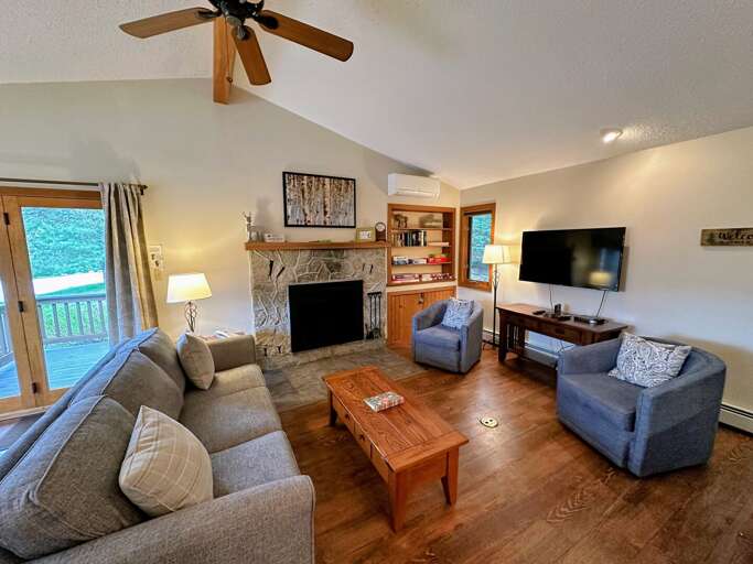 Interior Living Space With Furniture And TV