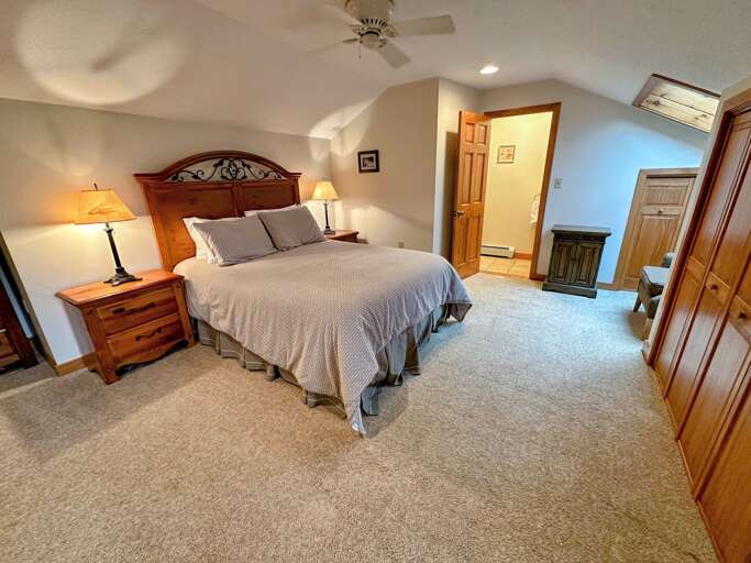 Upper level queen bedroom with ensuite bath