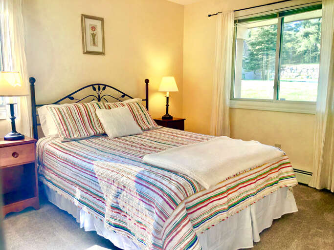 Guest Bedroom #2 is located on the main Level and features a Queen size bed. Sleeps 2.