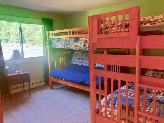 Guest Bedroom #3 is located on the main level and features 1Twin/Twin bunk bed and 1 Twin/Full bunk bed. Sleeps 5.