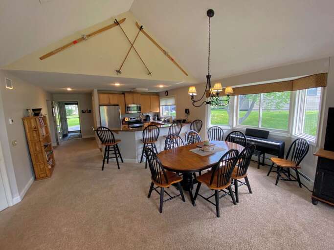 Interior Dining Area With Table, Chairs, And View Of Kitchen