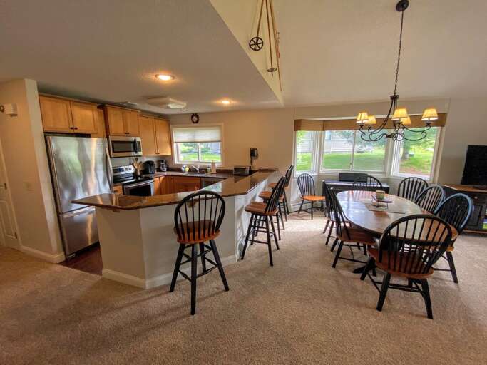 Kitchen is fully stocked for all your cooking needs and includes a Keurig coffee maker and breakfast bar that seats 4.