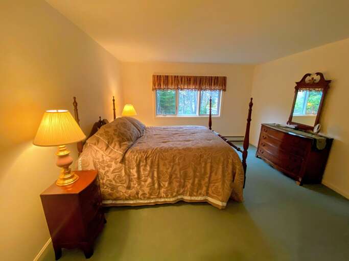 Master Bedroom features a Queen size bed and attached bath. Sleeps 2.