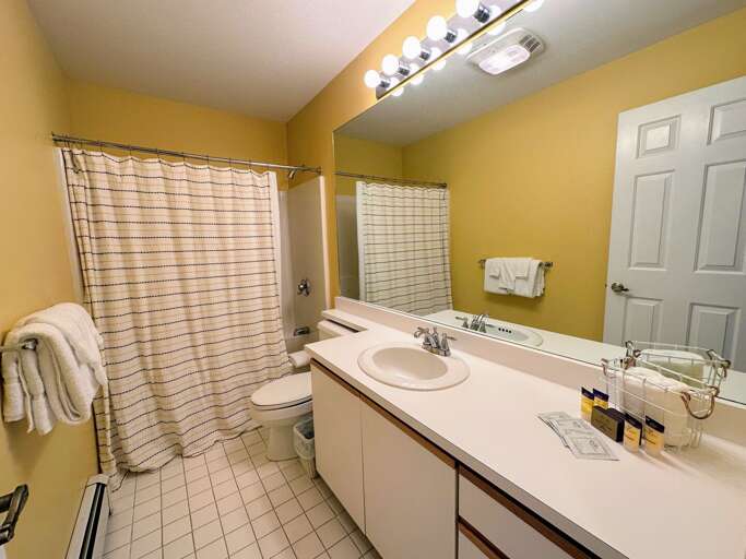 Shared full bath with shower/tub combo