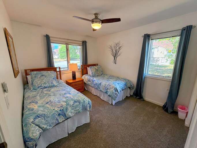 Guest bedroom #2 is located on the main level and features 2 Twin beds and ceiling fan. Sleeps 2. Guest bedroom #2 is located on the main level and features 2 Twin beds and ceiling fan. Sleeps 2.