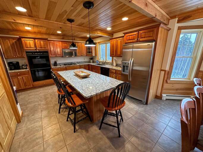 Kitchen - On Main Level. Pantry closet and stainless steel appliances.