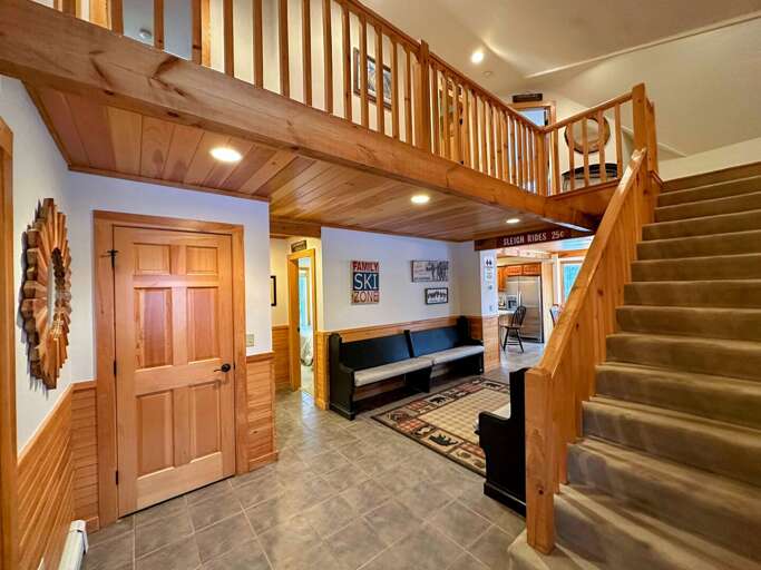 The second level features an open loft area overlooking the living room, along with 3 additional bedrooms and a shared full bath