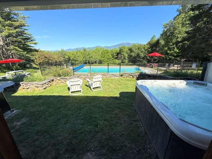 Hot tub and pool seen from the patio