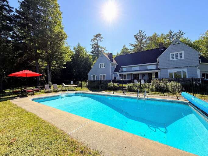 Pool with the house in the background
