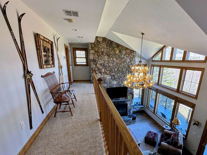 Upstairs Hallway to 3 bedrooms and private baths Upstairs Hallway to 3 bedrooms and private baths