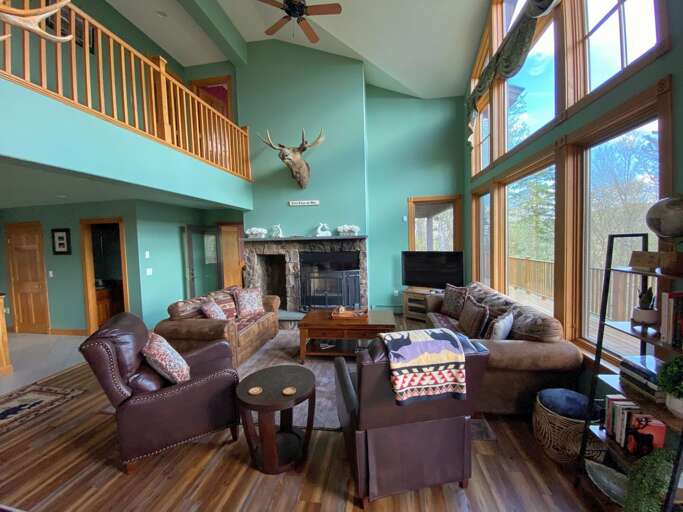 Main level living room with Mount Washington views