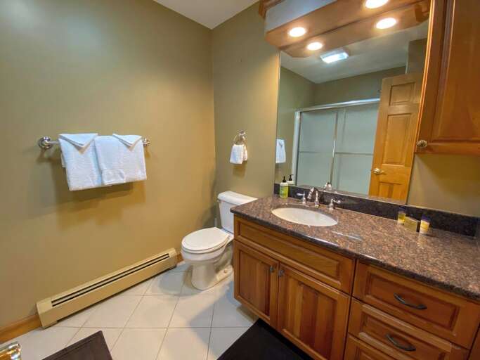 Upper level first bedroom ensuite full bath