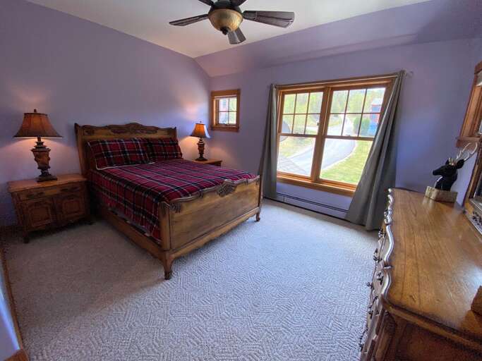 Upper level middle bedroom with ensuite full bath