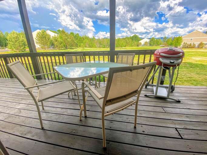 Patio with electric grill and table with 4 chairs Patio with electric grill and table with 4 chairs