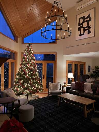 Living room with walkout upper deck and open concept Dining and Kitchen areas