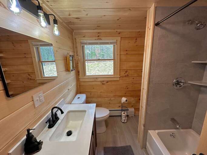 Full shared bath with shower/tub combo