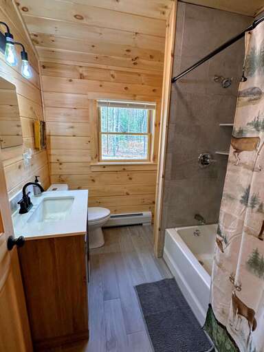Full shared bath with shower/tub combo