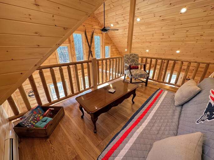 Loft area overlooking the main area with board games