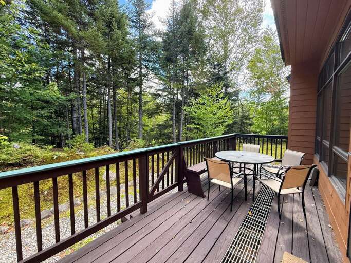 Back deck on the main level past the living room.