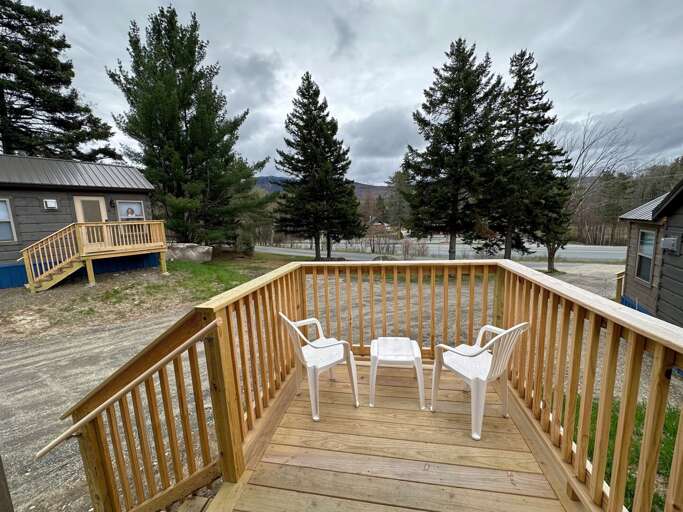 Cozy deck by the main door.