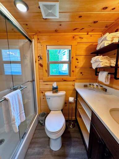 The bathroom is equipped with a shower. The bathroom is equipped with a shower.