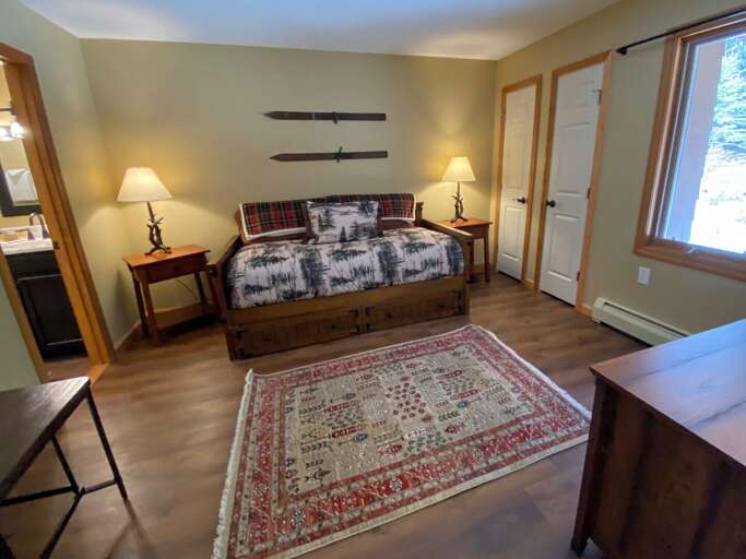 Main level Day bed with trundle desk, TV and attached bathroom - sleeps up to two