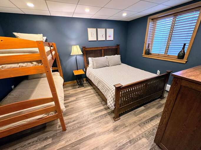 Lower level bedroom with Queen bed and twin/twin bunk