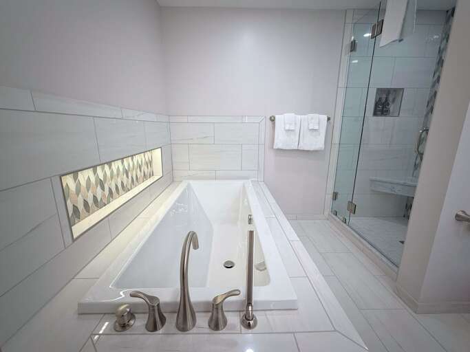 Lower Level Bathroom, renovated in 2026, with soaking tub, custom shower and double vanity