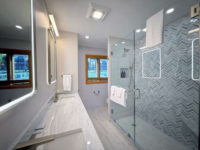 Upper Level King Bedroom 1 Ensuite Bath with custom shower and double vanity