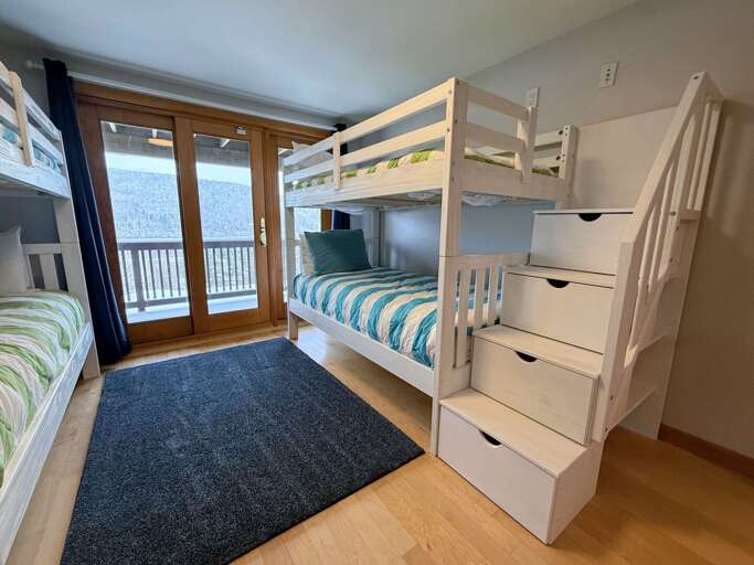 Lower Level Bunk Bedroom with Two Twin-over-Twin Bunk Beds