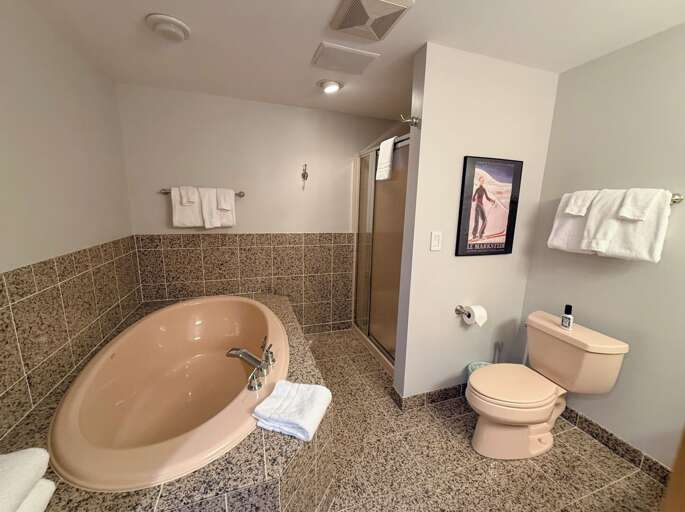 Lower Level Shared Full Bath with Shower and Tub