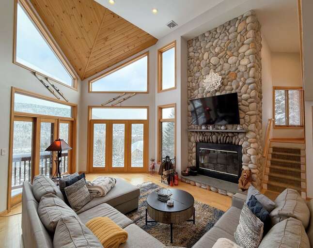 Main Living Room with Wood Fireplace and TV (winter)