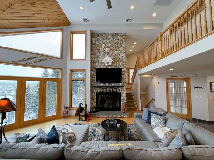 Main Living Room with Wood Fireplace and TV (winter)