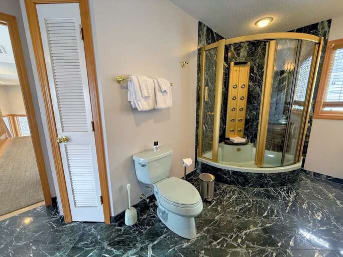 Upper Level Shared Bathroom with Shower