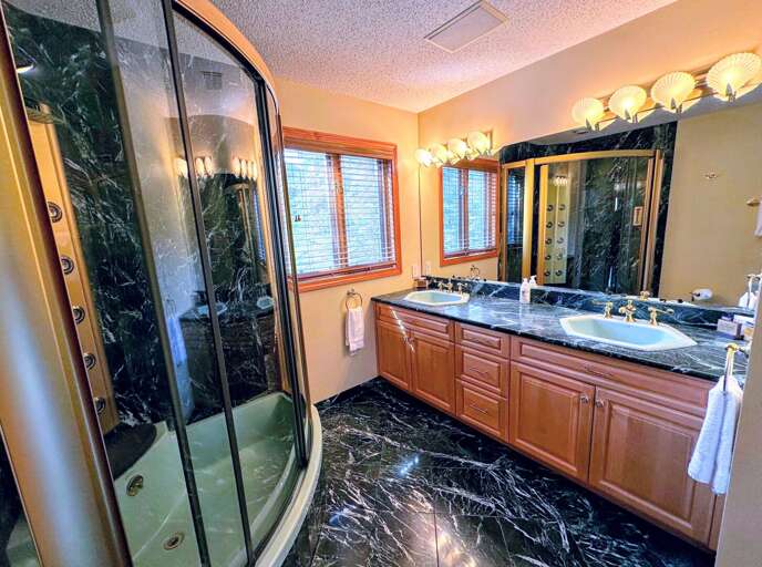 Upper Level Shared Bathroom with Shower