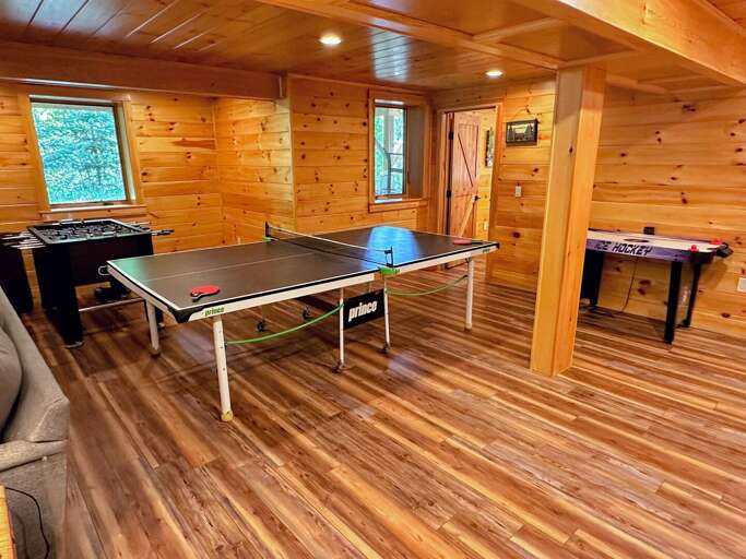 Lower level with foosball, ping pong, and small air hockey