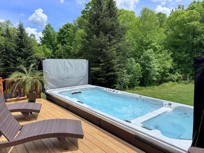 The new swimspa with attached deck - a great way to get a morning swim, or to soothe your muscles after a hike! With a pool side and a hot tub section, the choice is yours!