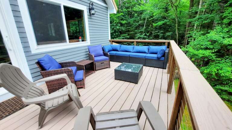 Upper level deck with grill and seating